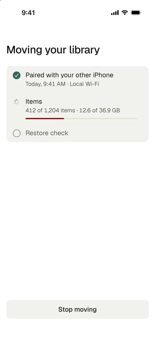 Moving your library: paired over local Wi-Fi, 412 of 1,204 items moved, restore check next