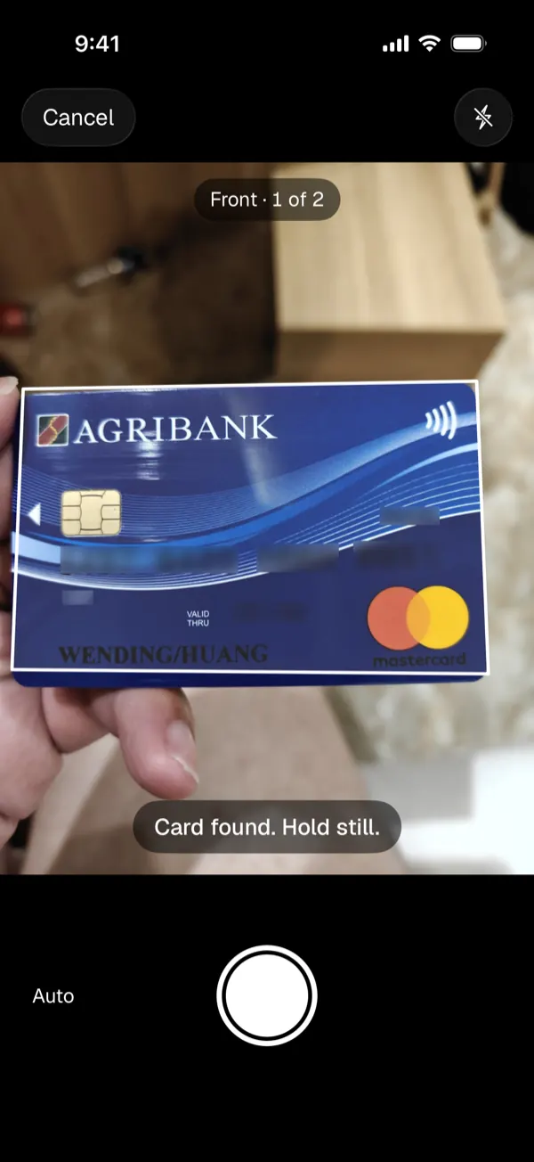 The York Vault card scanner over a bank card, with Front 1 of 2 and Card found, hold still