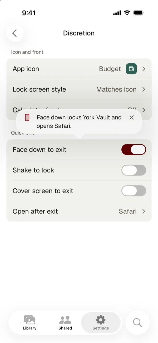 Discretion settings with a tip that face down locks York Vault and opens Safari, and Face down to exit switched on